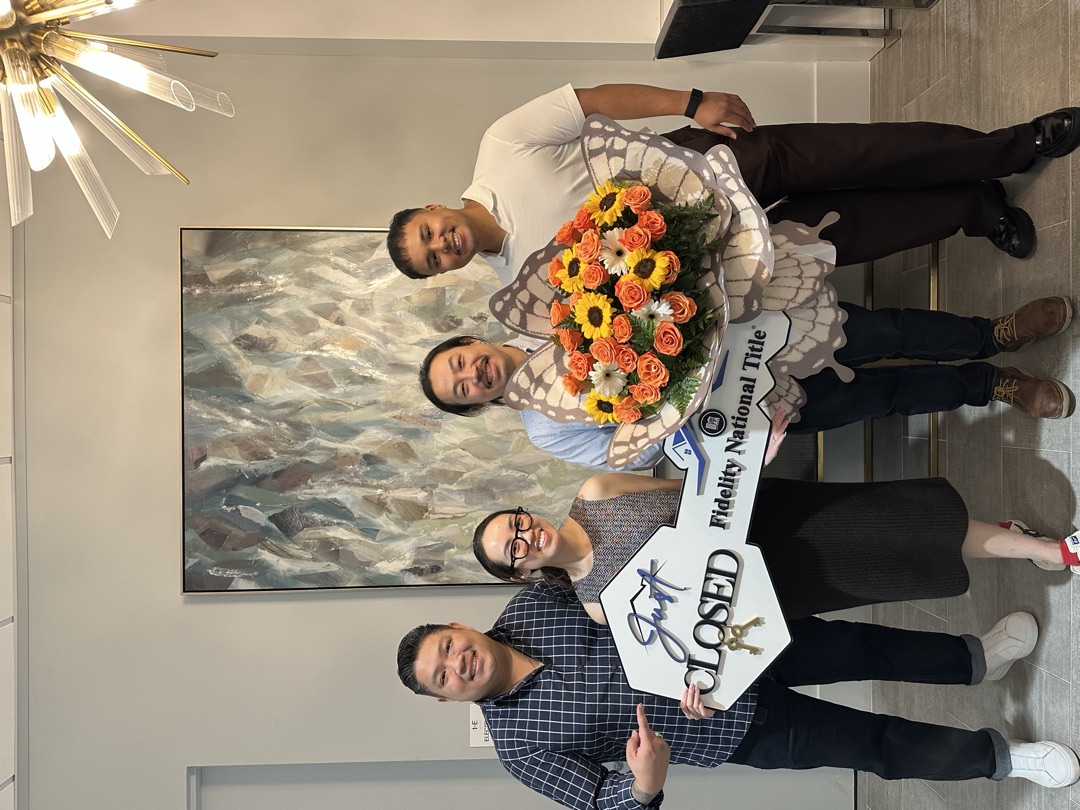 Happy homeowner at closing with Brandon Huynh
