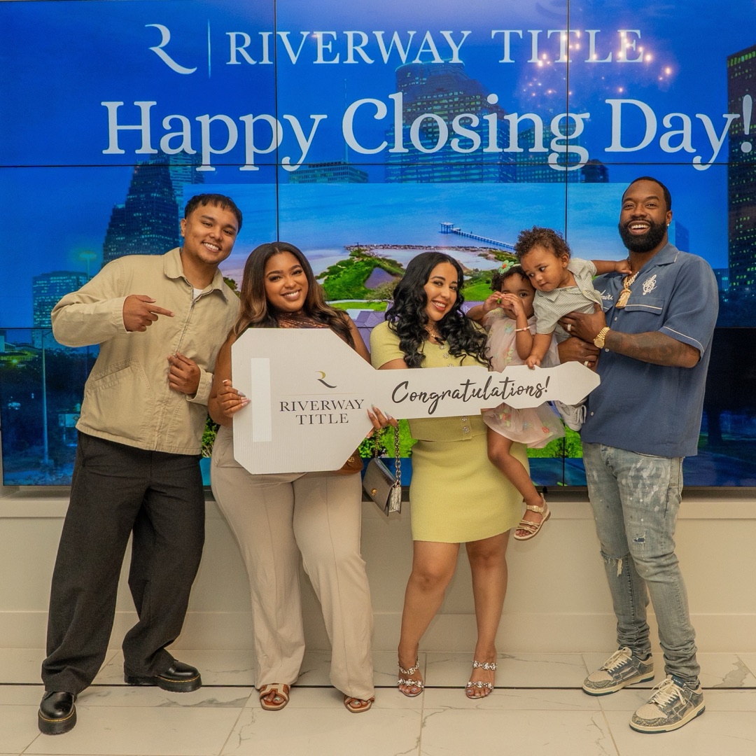 Happy homeowner at closing with Brandon Huynh
