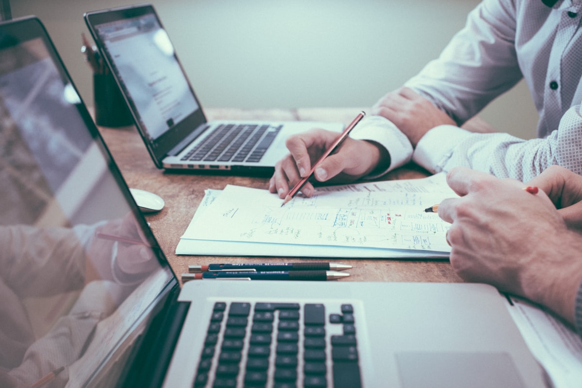 Business owner reviewing financial documents at a desk representing self-employed mortgage options